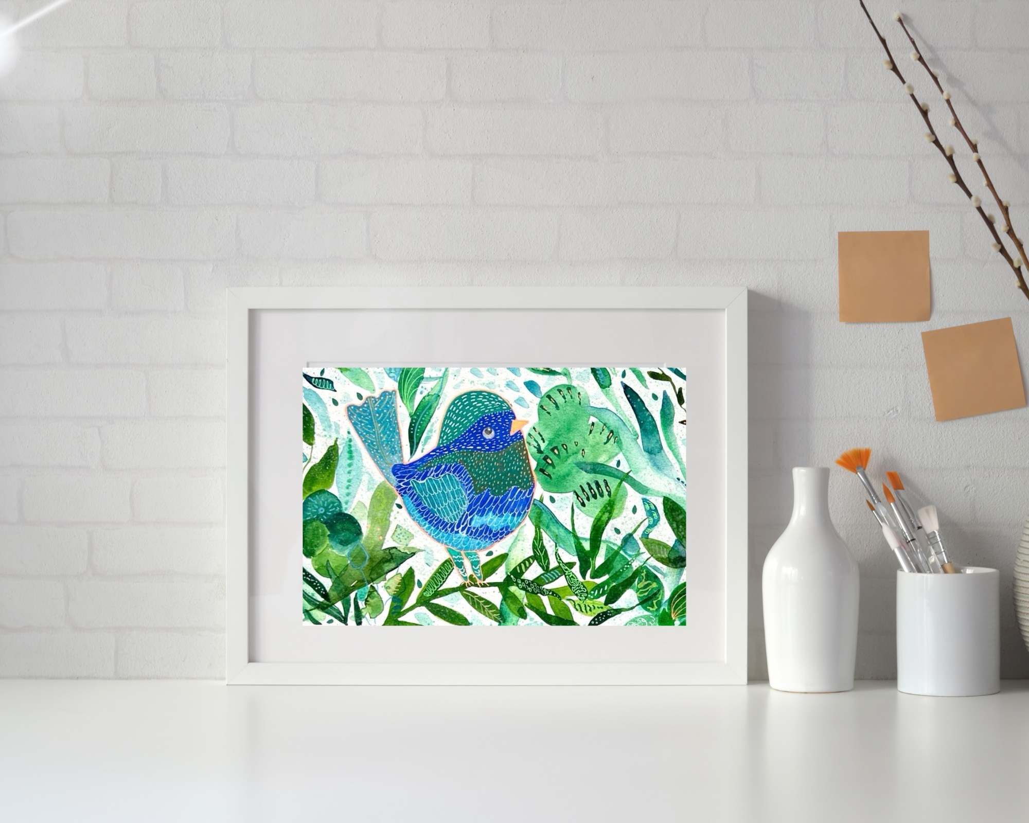 Framed blue bird botanical fine art print displayed in minimalist home setting — nature-inspired calming wall art by Monica Elena Atelier